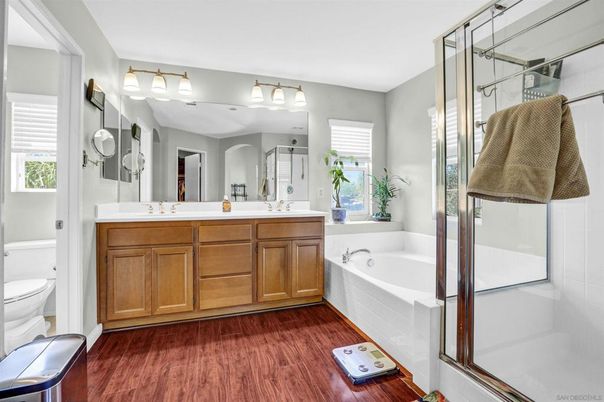 Bathroom, Dual Sink Vanities, Glass Shower, Interior, Wood Texture Flooring