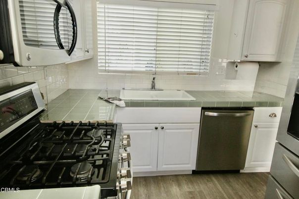 Interior, Kitchen, Tile Countertops, Wood Texture Flooring