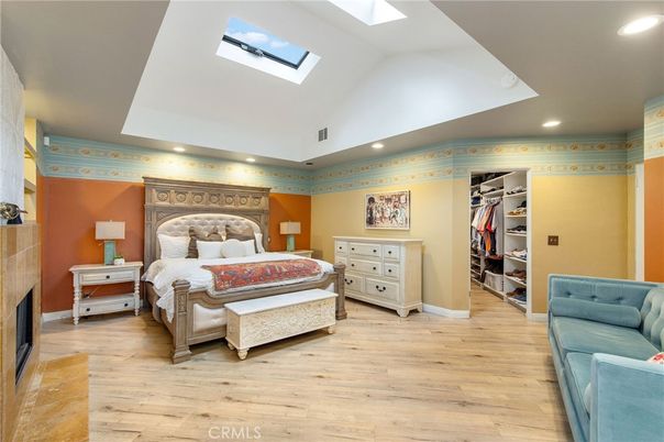 Bedroom, Fireplace, Interior, Recessed Lighting, Wood Texture Flooring