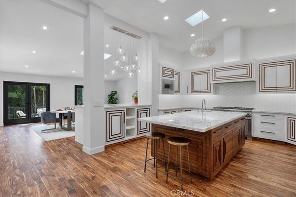 Dining room, Interior, Kitchen, Living room, Pendant Lights, Recessed Lighting, Stainless Steel Appliances, Wood Texture Flooring