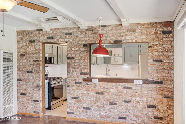 Interior, Kitchen, Pendant Lights, Stainless Steel Appliances, Stone Walls, Wood Texture Flooring