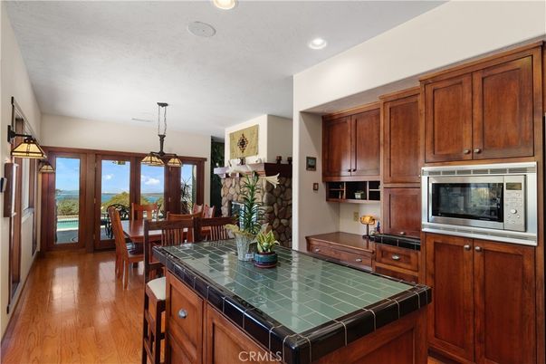 Dining room, Interior, Kitchen, Pendant Lights, Recessed Lighting, Tile Countertops, Wood Texture Flooring