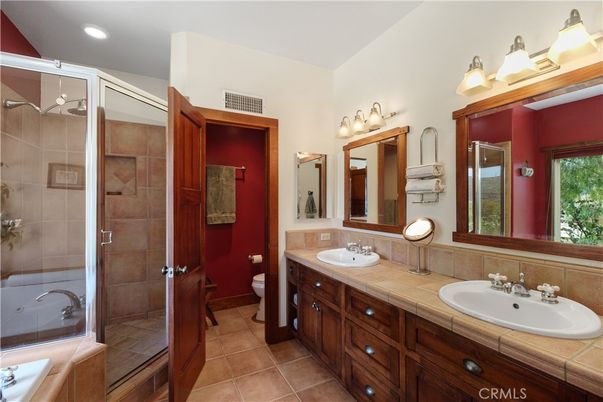 Bathroom, Dual Sink Vanities, Glass Shower, Interior, Recessed Lighting, Tile Countertops
