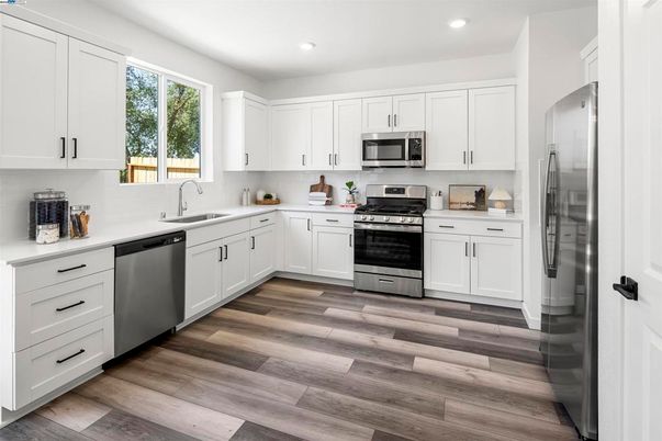 Interior, Kitchen, Recessed Lighting, Stainless Steel Appliances, Wood Texture Flooring