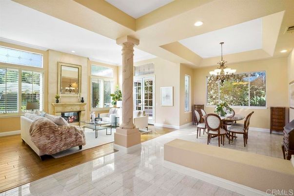 Chandelier, Dining room, Fireplace, Interior, Living room, Recessed Lighting, Wood Texture Flooring