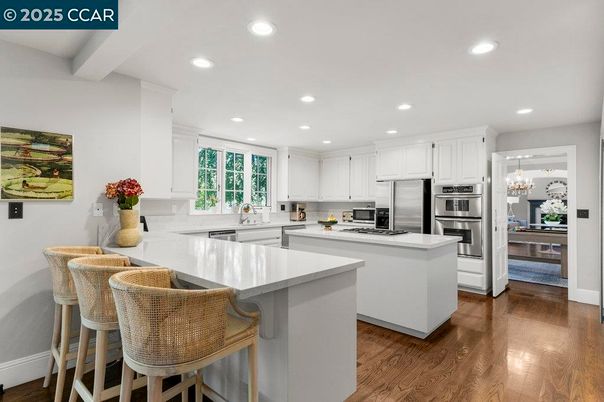 Chandelier, Interior, Kitchen, Recessed Lighting, Stainless Steel Appliances, Wood Texture Flooring