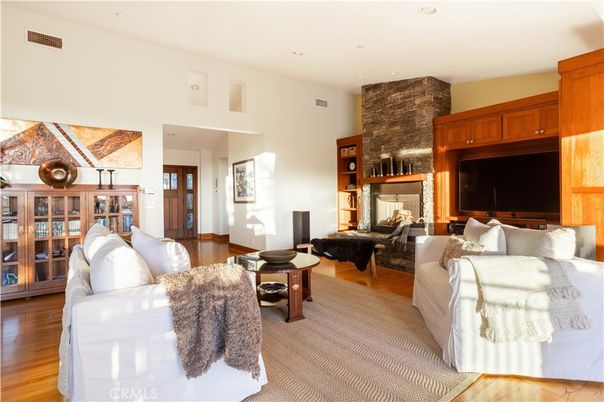 Fireplace, Interior, Living room, Recessed Lighting, Stone Walls, Wood Texture Flooring