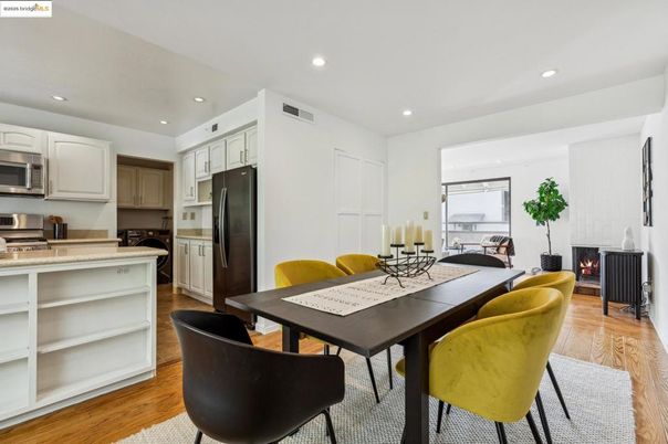 Dining room, Fireplace, Interior, Kitchen, Recessed Lighting, Stainless Steel Appliances, Wood Texture Flooring