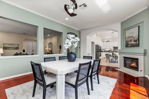 Dining room, Fireplace, Interior, Kitchen, Recessed Lighting, Wood Texture Flooring