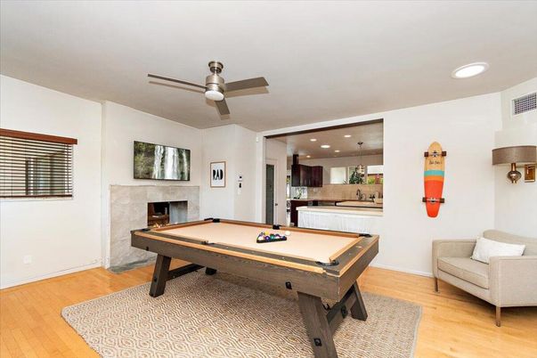 Billiard Table, Fireplace, Game Room, Interior, Kitchen, Pendant Lights, Recessed Lighting, Wood Texture Flooring