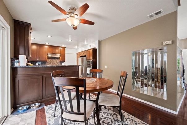 Dining room, Interior, Kitchen, Recessed Lighting, Stainless Steel Appliances, Wood Texture Flooring