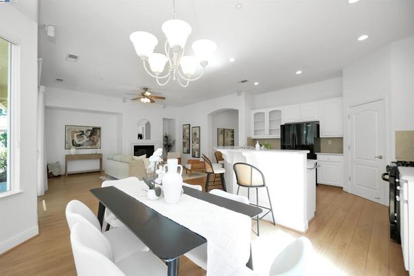 Chandelier, Dining room, Interior, Kitchen, Living room, Recessed Lighting, Wood Texture Flooring