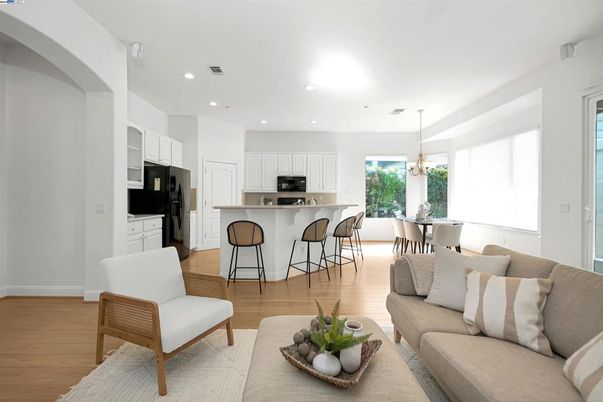 Chandelier, Dining room, Interior, Kitchen, Living room, Pendant Lights, Recessed Lighting, Stainless Steel Appliances, Wood Texture Flooring