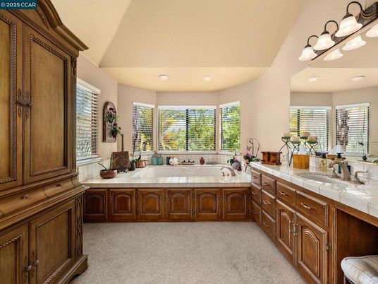 Bathroom, Dual Sink Vanities, Interior, Recessed Lighting, Tile Countertops