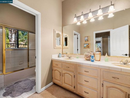 Bathroom, Dual Sink Vanities, Glass Shower, Interior, Tile Countertops