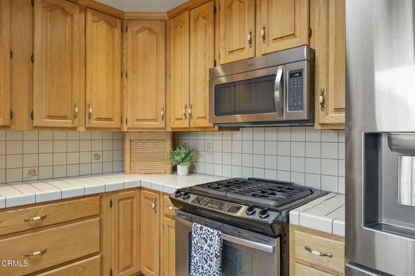 Interior, Kitchen, Stainless Steel Appliances, Tile Countertops