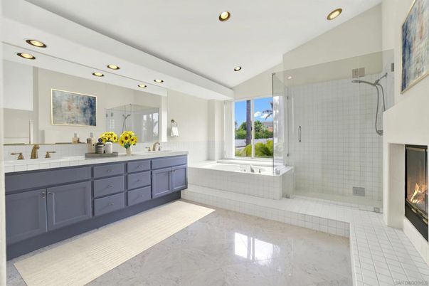 Bathroom, Dual Sink Vanities, Fireplace, Glass Shower, Interior, Marble, Recessed Lighting, Tile Countertops