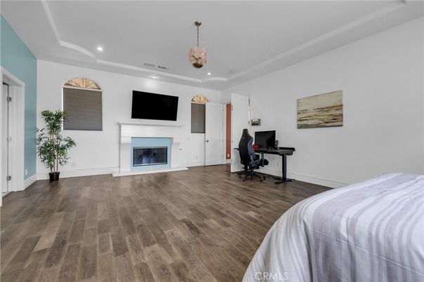 Bedroom, Fireplace, Home Office, Interior, Pendant Lights, Recessed Lighting, Wood Texture Flooring