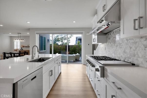 Dining room, Interior, Kitchen, Living room, Pendant Lights, Recessed Lighting, Stainless Steel Appliances, Wood Texture Flooring
