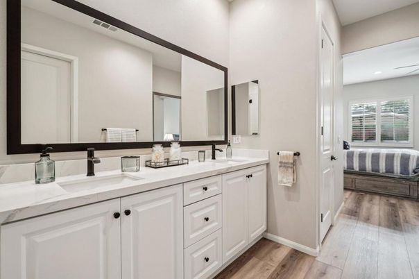 Bathroom, Dual Sink Vanities, Interior, Recessed Lighting, Wood Texture Flooring