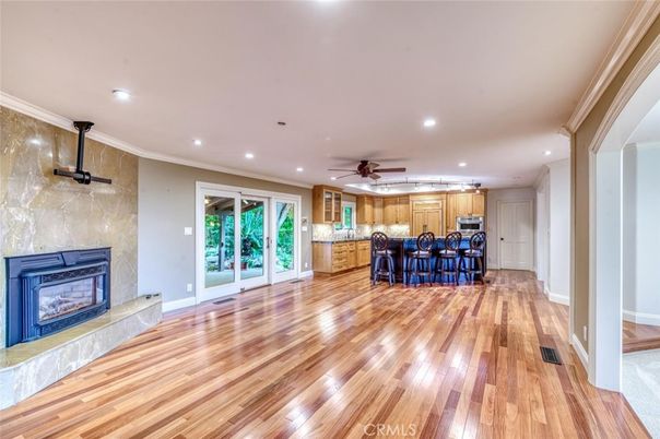Empty room, Fireplace, Interior, Kitchen, Recessed Lighting, Wood Texture Flooring