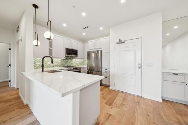 Interior, Kitchen, Pendant Lights, Recessed Lighting, Stainless Steel Appliances, Wood Texture Flooring