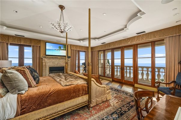 Bedroom, Fireplace, Interior, Recessed Lighting, Water, Wood Texture Flooring
