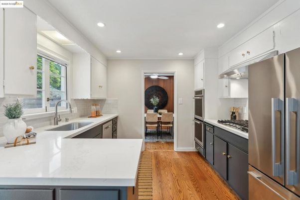 Dining room, Interior, Kitchen, Recessed Lighting, Stainless Steel Appliances, Wood Texture Flooring