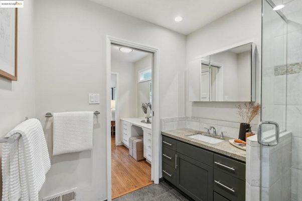 Bathroom, Dual Sink Vanities, Interior, Recessed Lighting, Wood Texture Flooring