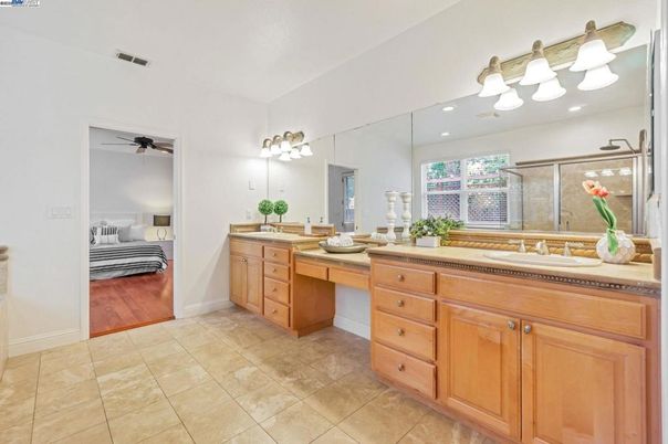 Bathroom, Bedroom, Dual Sink Vanities, Glass Shower, Interior, Recessed Lighting, Wood Texture Flooring