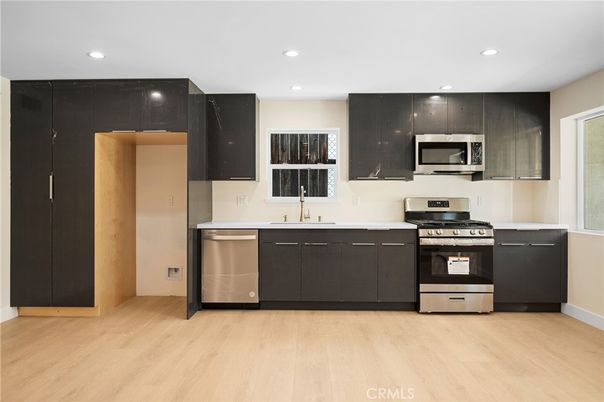 Interior, Kitchen, Recessed Lighting, Stainless Steel Appliances, Wood Texture Flooring