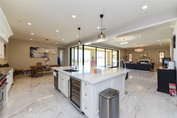 Chandelier, Dining room, Interior, Kitchen, Living room, Marble, Pendant Lights, Recessed Lighting, Stainless Steel Appliances