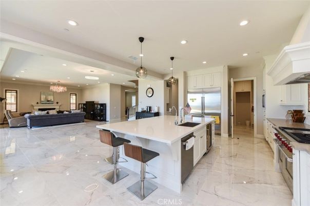 Chandelier, Interior, Kitchen, Living room, Marble, Pendant Lights, Recessed Lighting, Stainless Steel Appliances