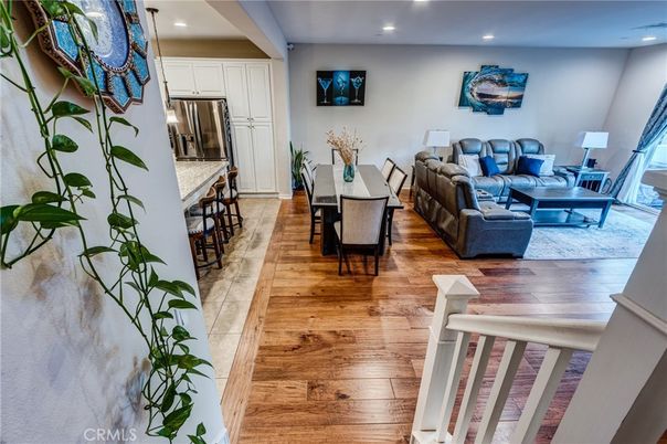 Dining room, Interior, Kitchen, Living room, Recessed Lighting, Stainless Steel Appliances, Wood Texture Flooring