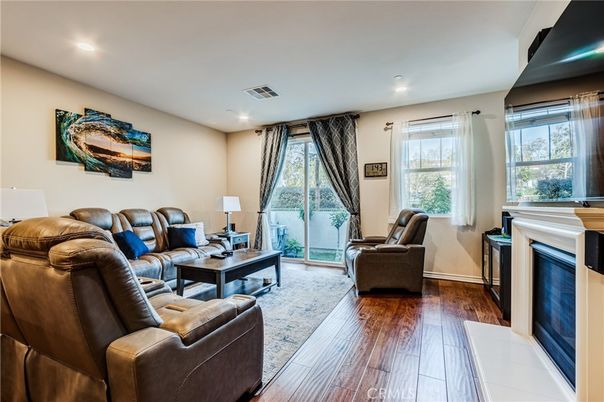 Fireplace, Interior, Living room, Recessed Lighting, Wood Texture Flooring