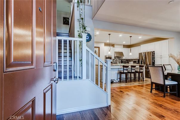 Dining room, Interior, Kitchen, Pendant Lights, Recessed Lighting, Stainless Steel Appliances, Wood Texture Flooring