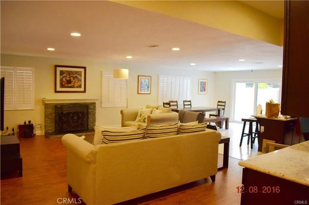 Dining room, Fireplace, Interior, Living room, Recessed Lighting, Wood Texture Flooring