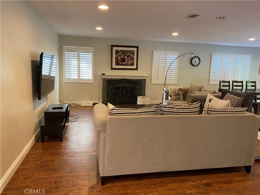 Fireplace, Interior, Living room, Recessed Lighting, Wood Texture Flooring