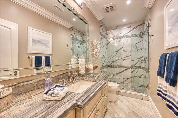 Bathroom, Glass Shower, Interior, Marble Walls, Recessed Lighting, Wood Texture Flooring
