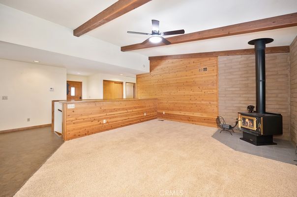 Empty room, Fireplace, Interior, Recessed Lighting, Stone Walls, Wooden Beams, Wooden Walls