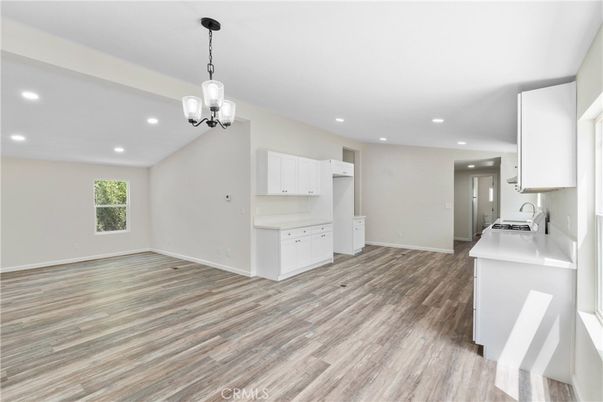 Empty room, Interior, Kitchen, Pendant Lights, Recessed Lighting, Wood Texture Flooring