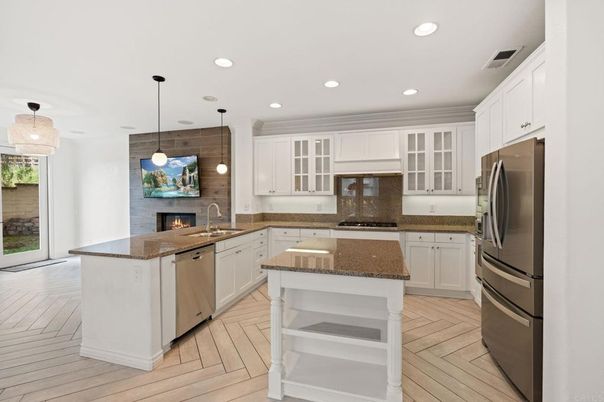 Fireplace, Interior, Kitchen, Pendant Lights, Recessed Lighting, Stainless Steel Appliances, Wood Texture Flooring
