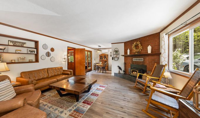 Dining room, Fireplace, Interior, Living room, Pendant Lights, Stone Walls, Wood Texture Flooring