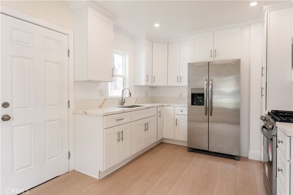 Interior, Kitchen, Recessed Lighting, Stainless Steel Appliances, Wood Texture Flooring