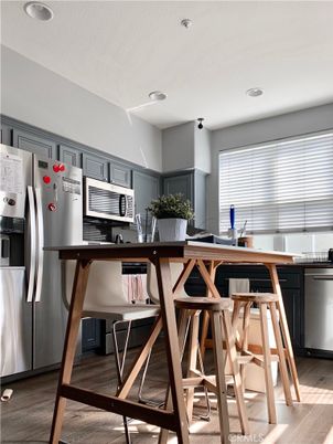 Dining room, Interior, Kitchen, Recessed Lighting, Stainless Steel Appliances, Wood Texture Flooring