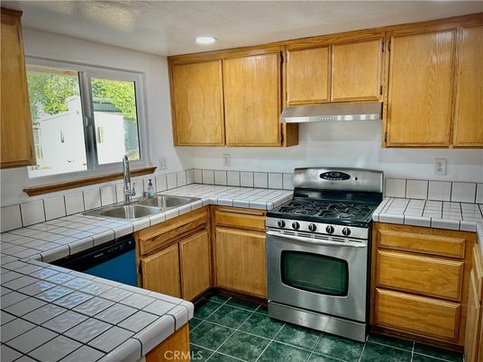 Interior, Kitchen, Recessed Lighting, Stainless Steel Appliances, Tile Countertops