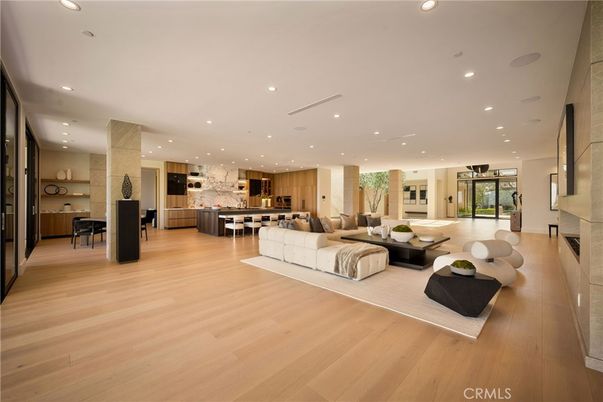 Dining room, Fireplace, Interior, Kitchen, Living room, Recessed Lighting, Stainless Steel Appliances, Wood Texture Flooring