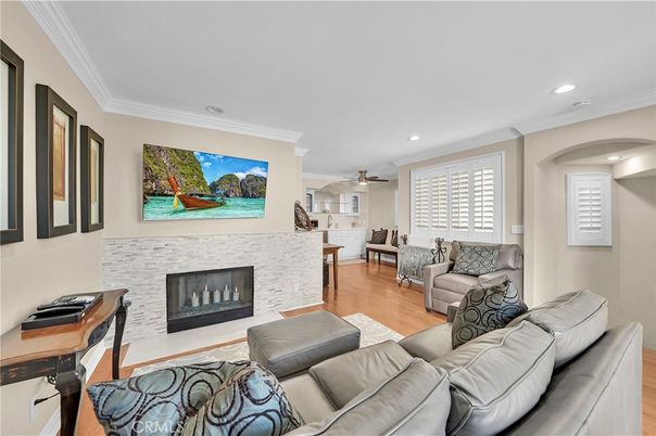 Dining room, Fireplace, Interior, Living room, Recessed Lighting, Wood Texture Flooring