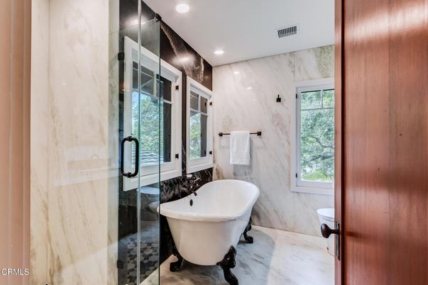 Bathroom, Free Standing Baths, Glass Shower, Interior, Marble, Marble Walls, Recessed Lighting