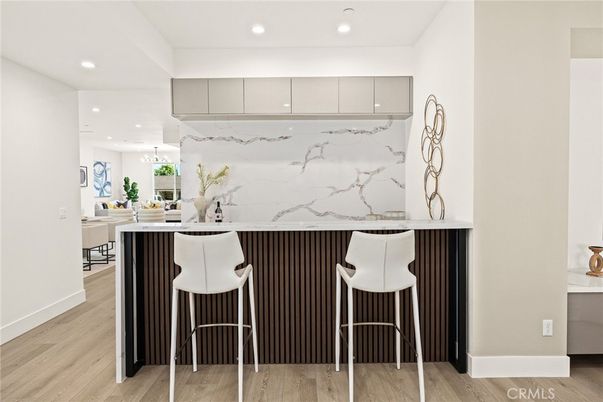 Interior, Kitchen, Marble Walls, Pendant Lights, Recessed Lighting, Wood Texture Flooring